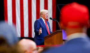 Trump touts economic plan after union rights row