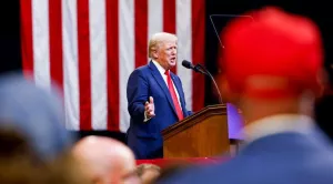 Trump touts economic plan after union rights row